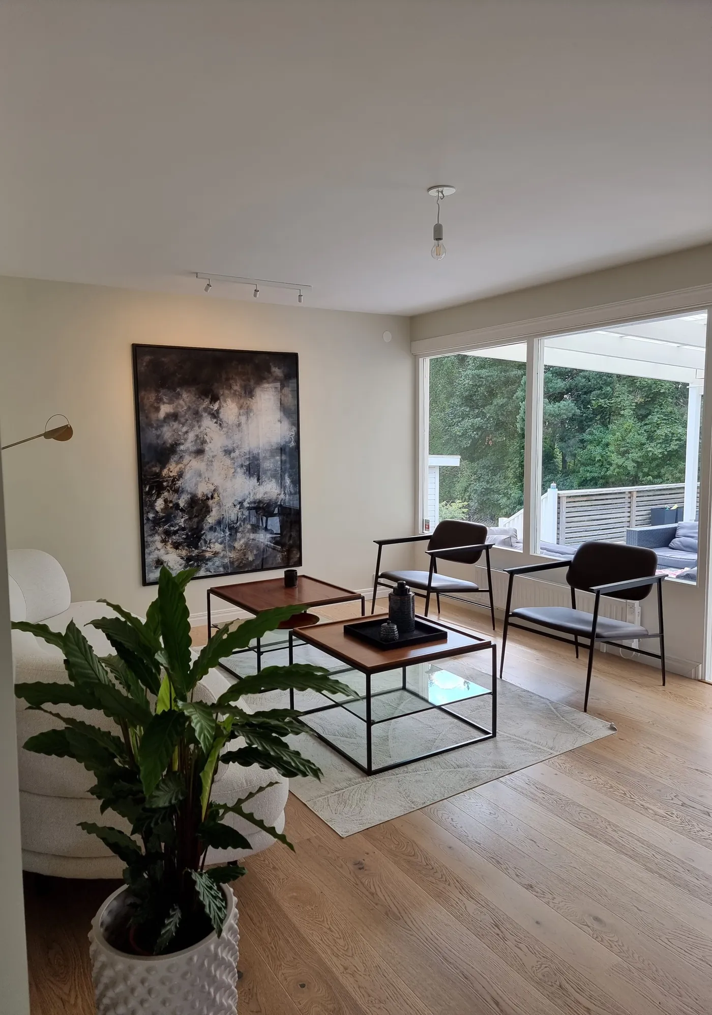 Small apartment living room in a calm neutral palette, Nairobi