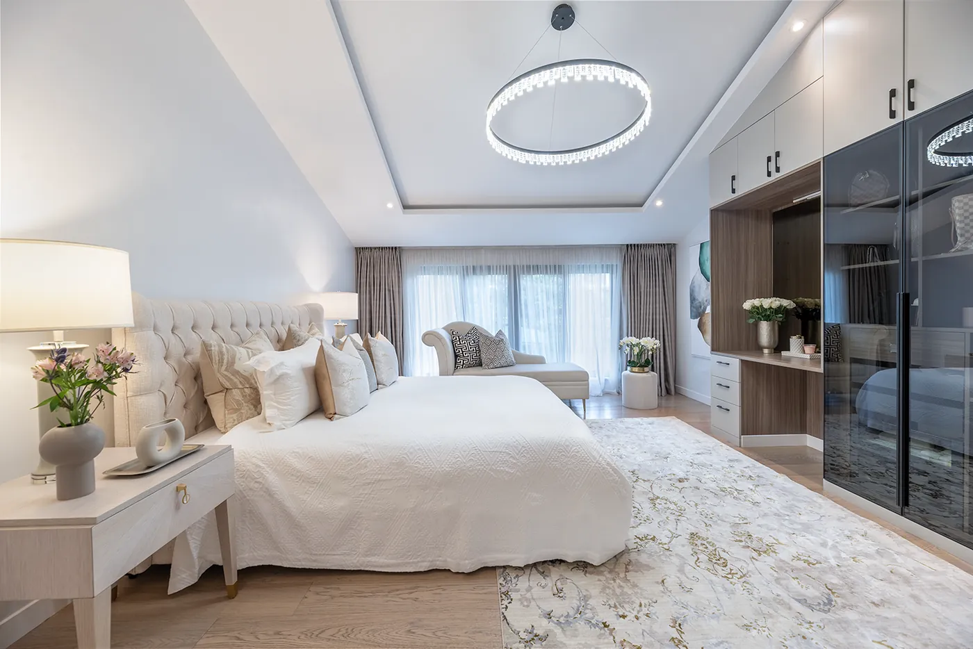 Bedroom suite with reading chair and soft furnishings