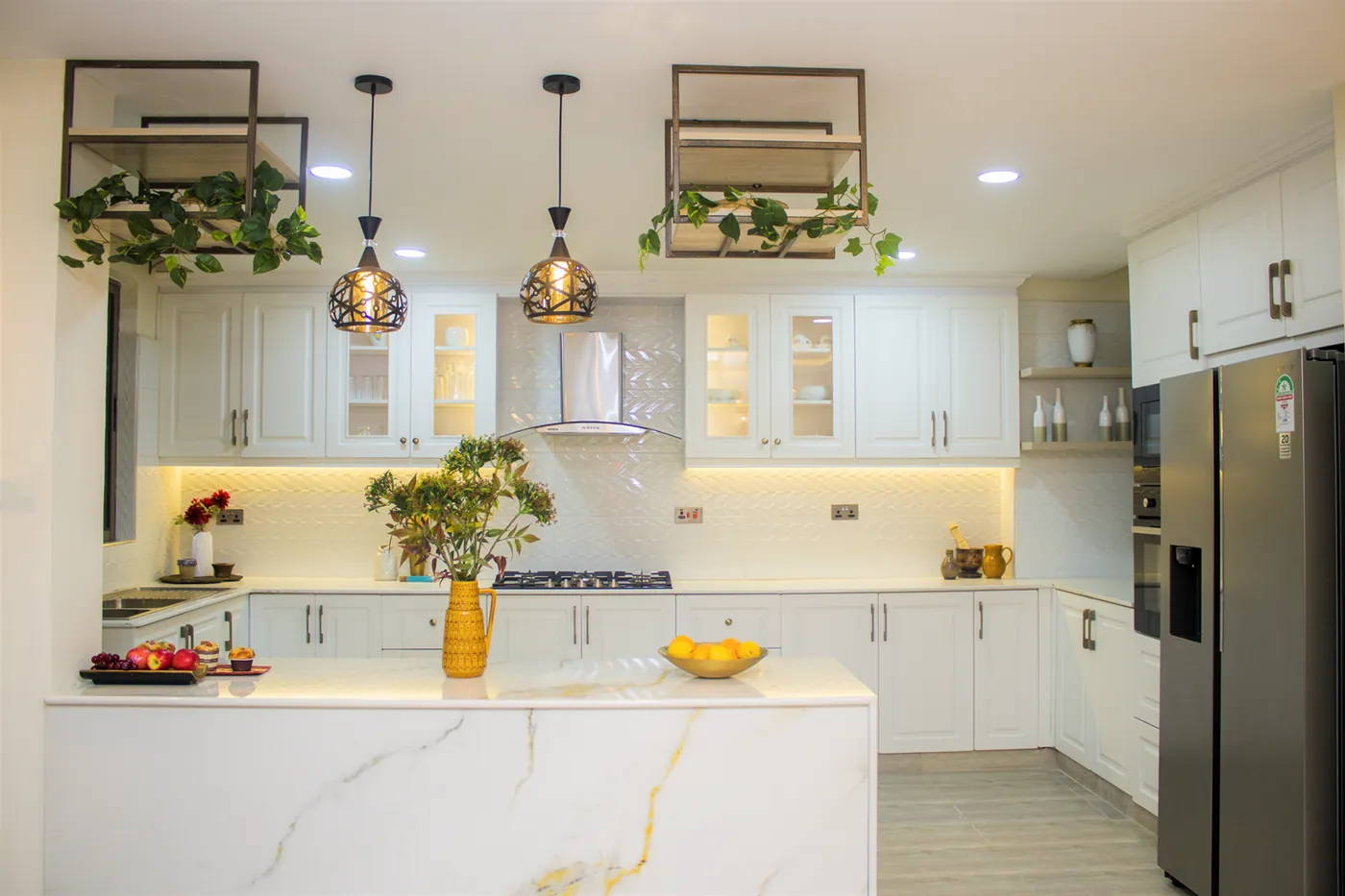 Fitted kitchen cabinets with island and pendant lighting, Nairobi