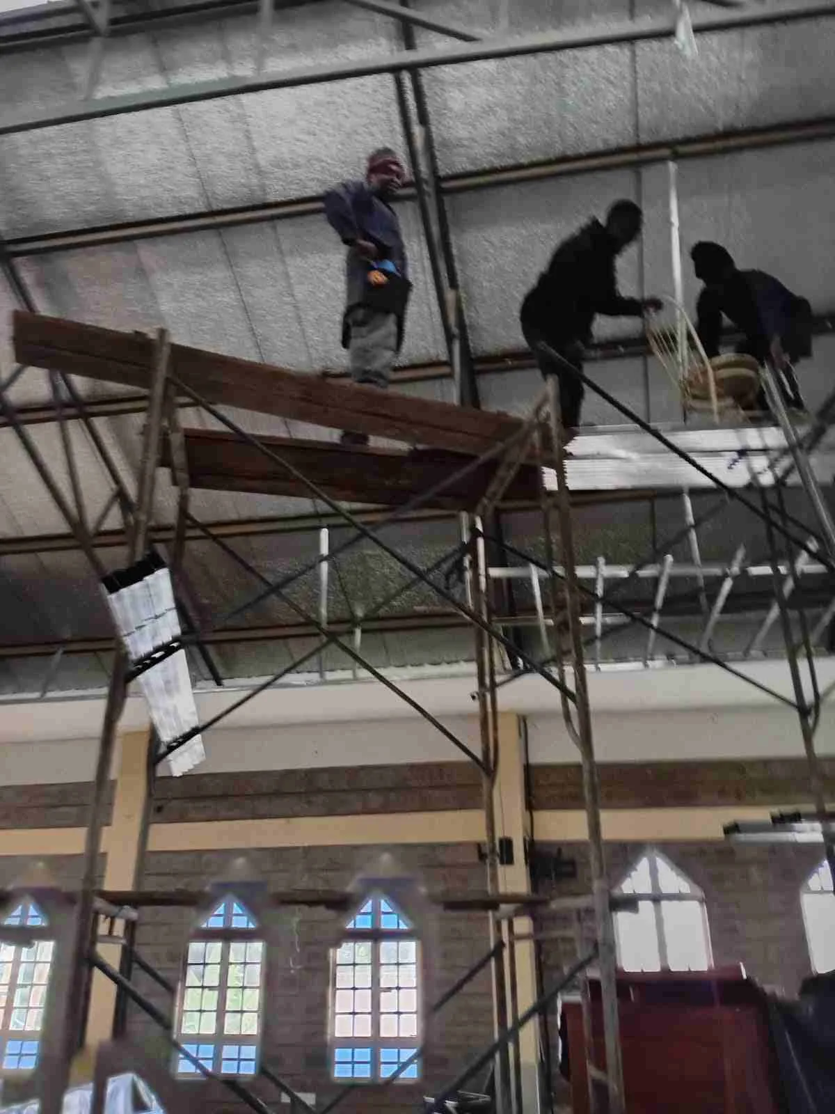 New metal roofing on compact modern homes in Kenya